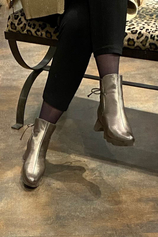 Taupe brown women's ankle boots with laces at the back.. Worn view - Florence KOOIJMAN